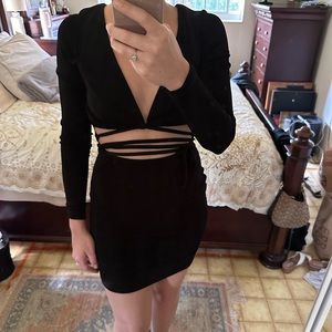 Etiquette boutique body con long sleeve multi way dress. Size small.